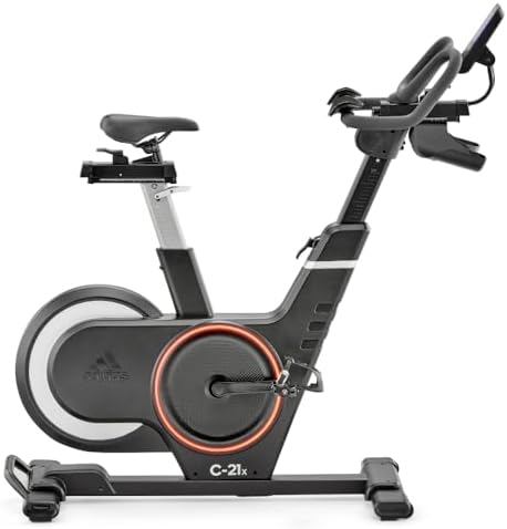Adidas C-21X profile shot showing the frame geometry, red flywheel ring, saddle and handlebar positions