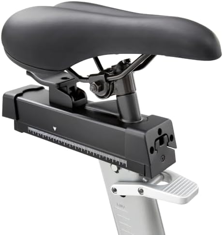 Adidas C-21X saddle and seat post with numbered slider rail for fore-aft adjustment, plastic non-cleat pedal cage visible