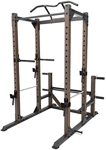 Steelbody Monster Cage alternate studio framing showing the front face of the cage, J-hook catches, and the kipping bar from a head-on angle